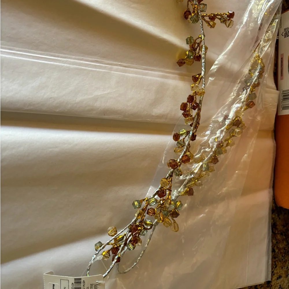 Beaded garland brown shades NWT Neiman Marcus 6 ft long